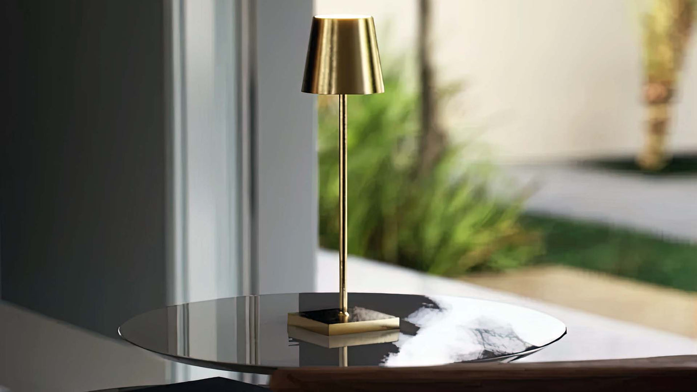 Olivia | Cordless Table Lamp | Aluminum | Gold color of product | Light off | Mid-range distance to lamp | At coffee table | Modern interior | Noon | Scene 2