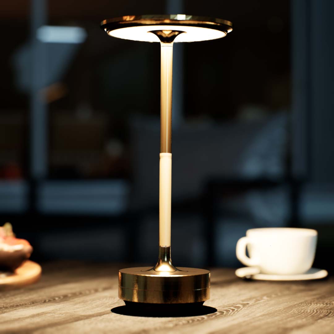 Amberly | Cordless Table Lamp | Aluminum | Gold color of product | Warm light on | Close-up distance to lamp | At patio | Modern design | Evening | Scene 3