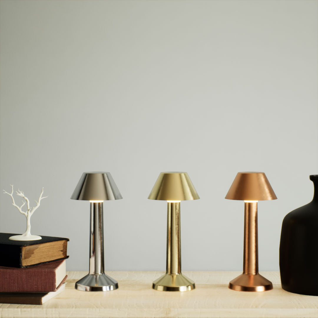 Bella | Cordless Table Lamp | Iron, Acrylic | Silver, Gold, Bronze color of products | Close-up distance to lamp | Three lamps standing one by one