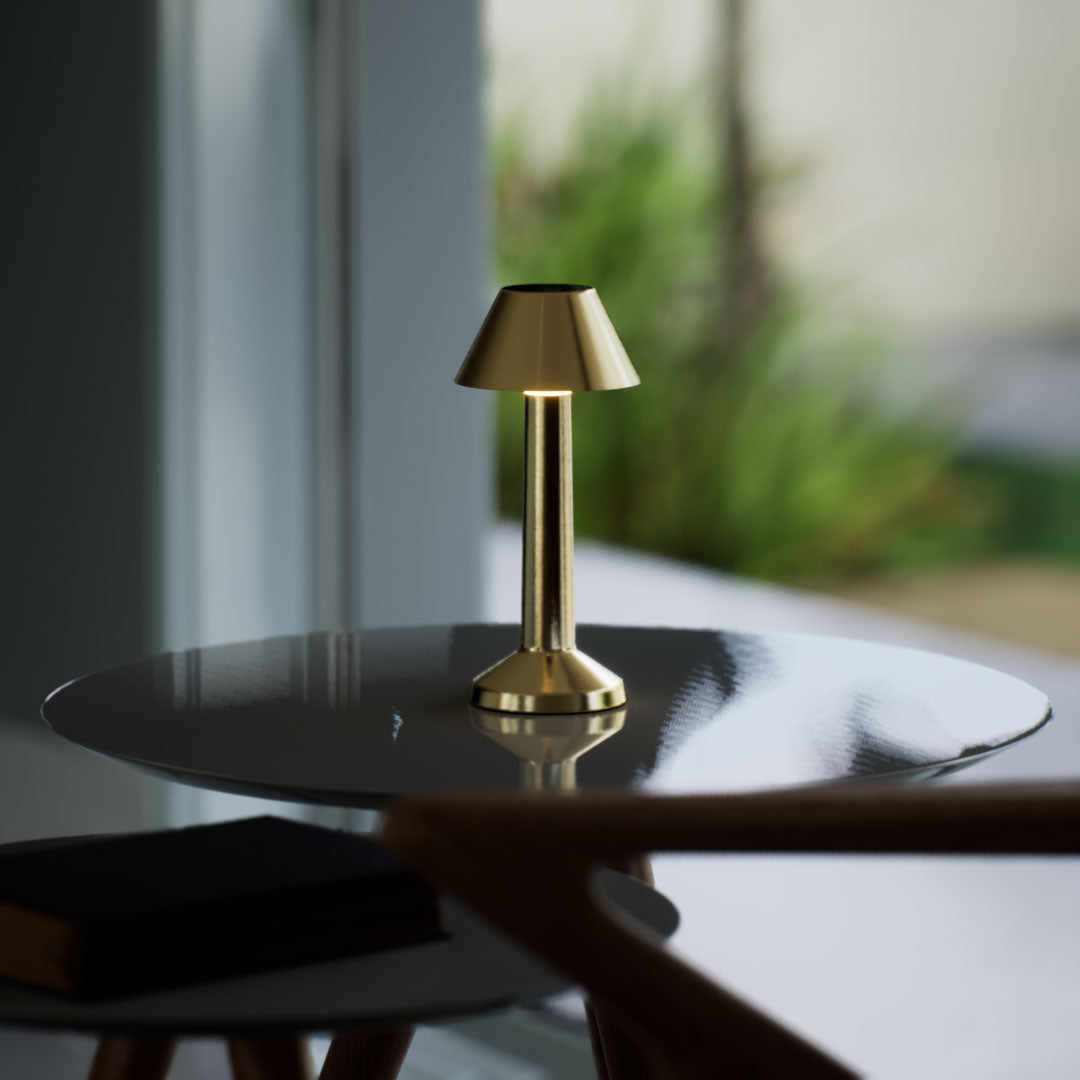 Bella | Cordless Table Lamp | Iron, Acrylic | Gold color of product | Light off | Close-up distance to lamp | At coffee table | Modern interior | Noon