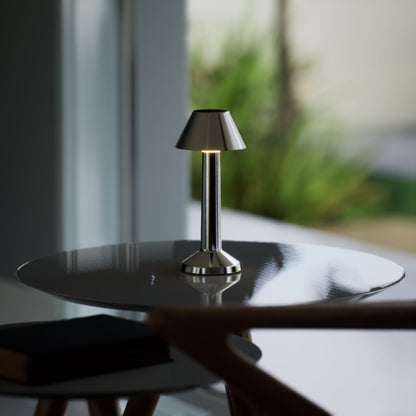Bella | Cordless Table Lamp | Iron, Acrylic | Silver color of product | Light off | Close-up distance to lamp | At coffee table | Modern interior | Noon