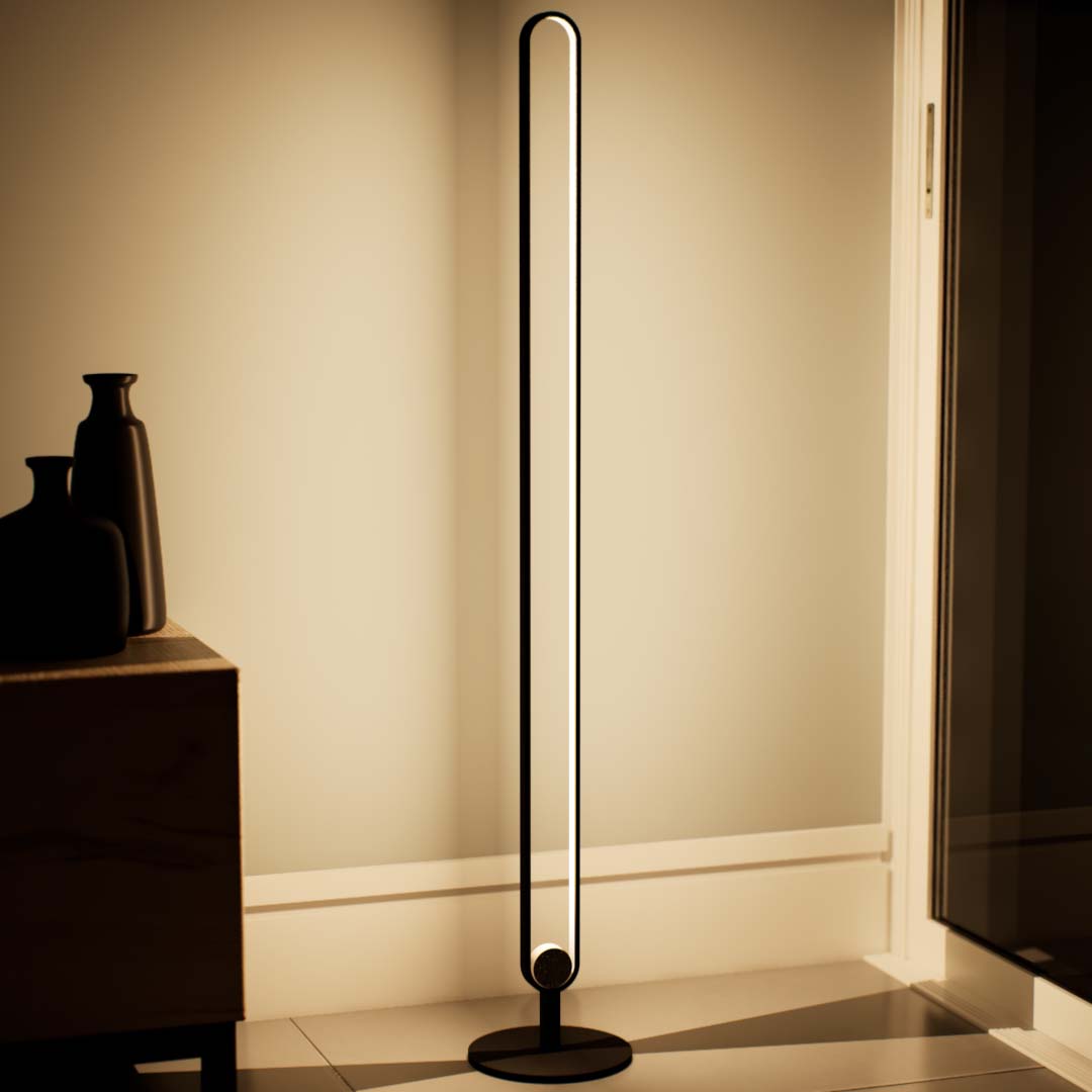 Celtis | Floor Lamp | Oval | Aluminium alloy, ABS | Medium | Black color of product | Natural light on | Closeup distance to lamp | In living room | Modern interior | Evening | One item | 53 in height of lamp | Scene 3 | 1x1