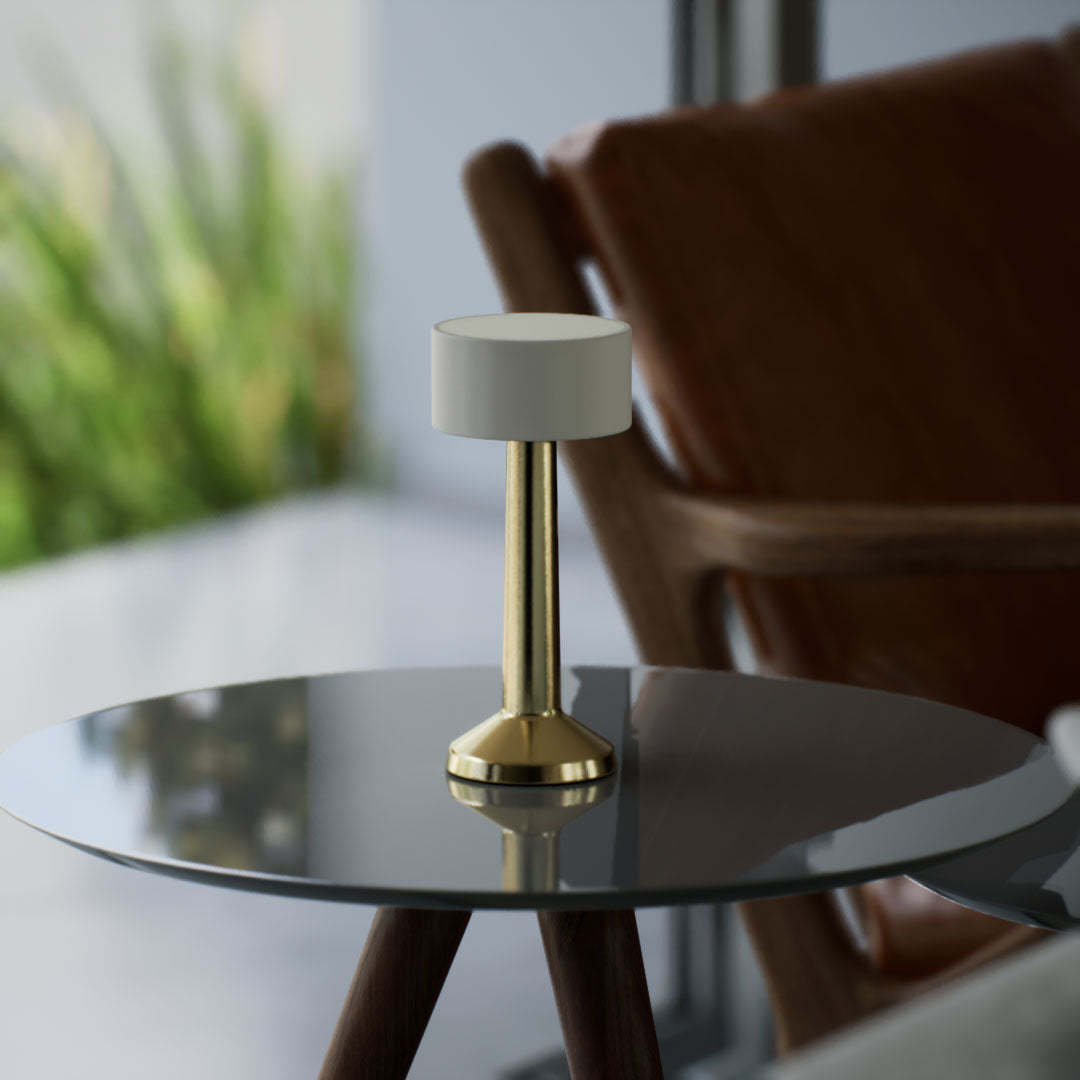 Halo | Cordless Table Lamp | Iron, Acrylic | Gold color of product | Light off | Close-up distance to lamp | At coffee table | Modern interior | Noon
