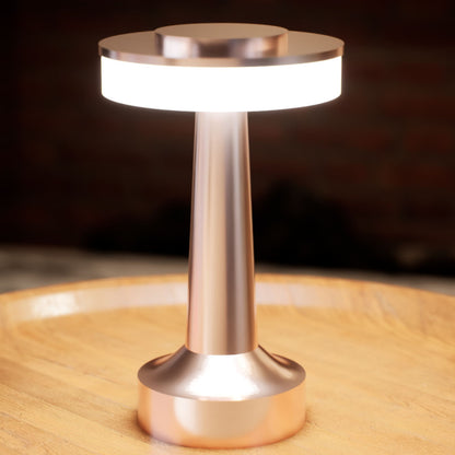 Halo Slim | Cordless Table Lamp | Iron, Acrylic | Bronze color of product | White light on | Close-up distance to lamp | At coffee table | Modern interior | Evening | Scene 4