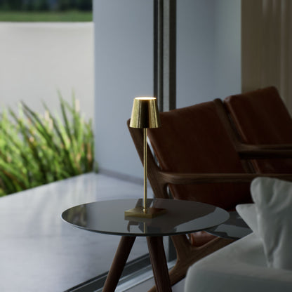 Olivia | Cordless Table Lamp | Aluminum | Gold color of product | Light off | Mid-range distance to lamp | At coffee table | Modern interior | Noon  | Scene 1